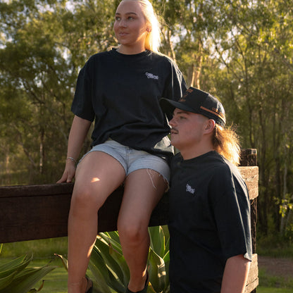 couple wearing cobba country big tee