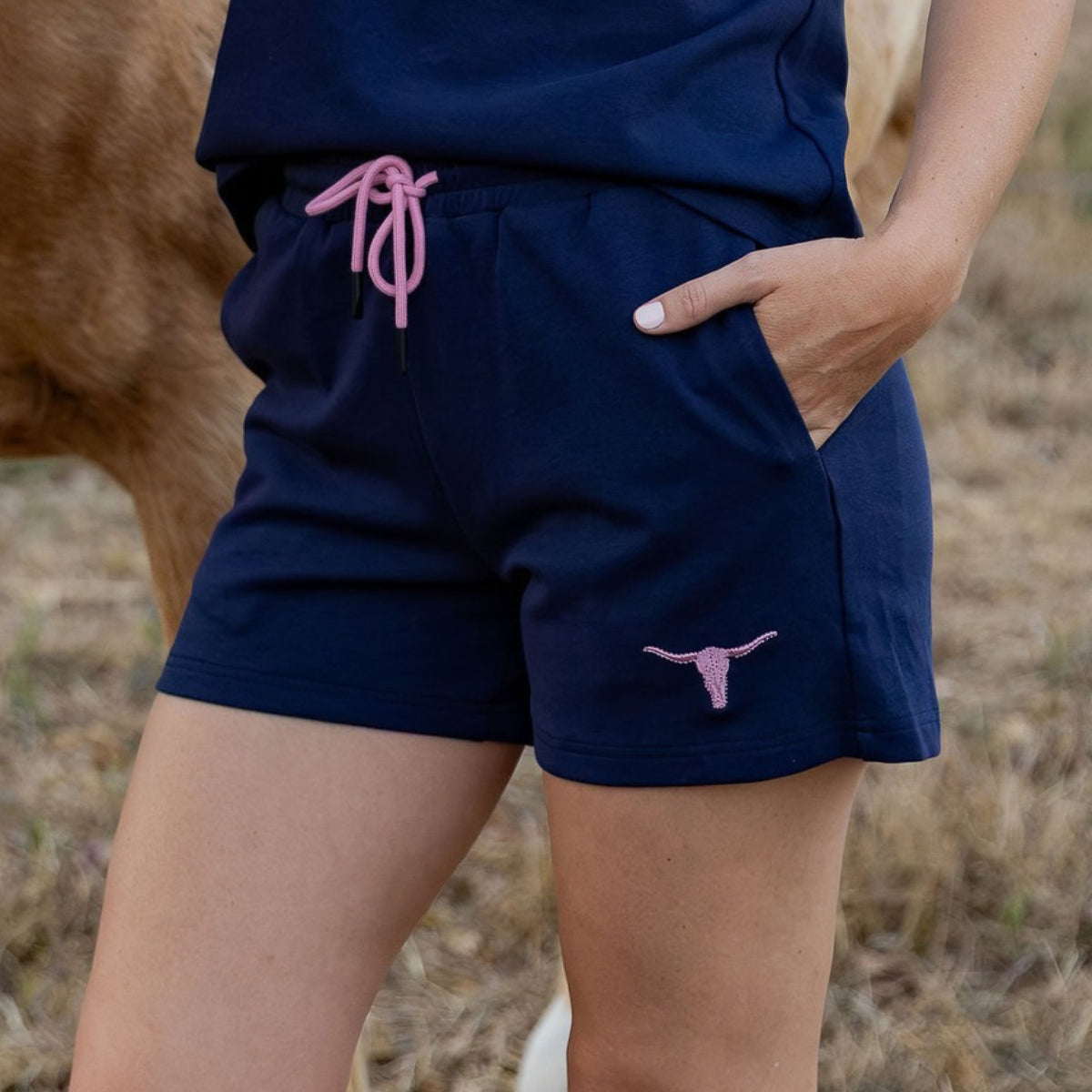 Womens navy loungewear shorts with pink drawstring and embroidered pink longhorn, heavyweight cotton blend by Cobba Country