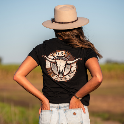 cobba_country_womens_hunter_tee_back_cowhide_brown_pattern_outdoor.jpg
